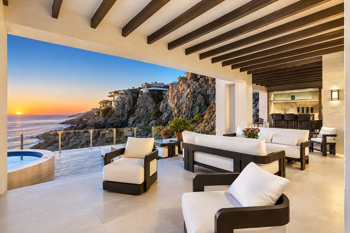 VIP Cliffside Villa Pedregal outdoor terrace with jacuzzi and bar at sunset